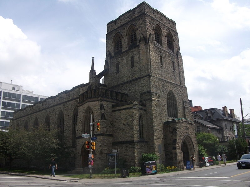 Exterior photo featuring elements of English Gothic and Norman Church architecture, built in 1933.